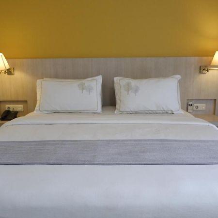 Rio City Hotel Palembang Esterno foto