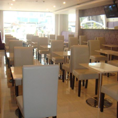 Rio City Hotel Palembang Esterno foto