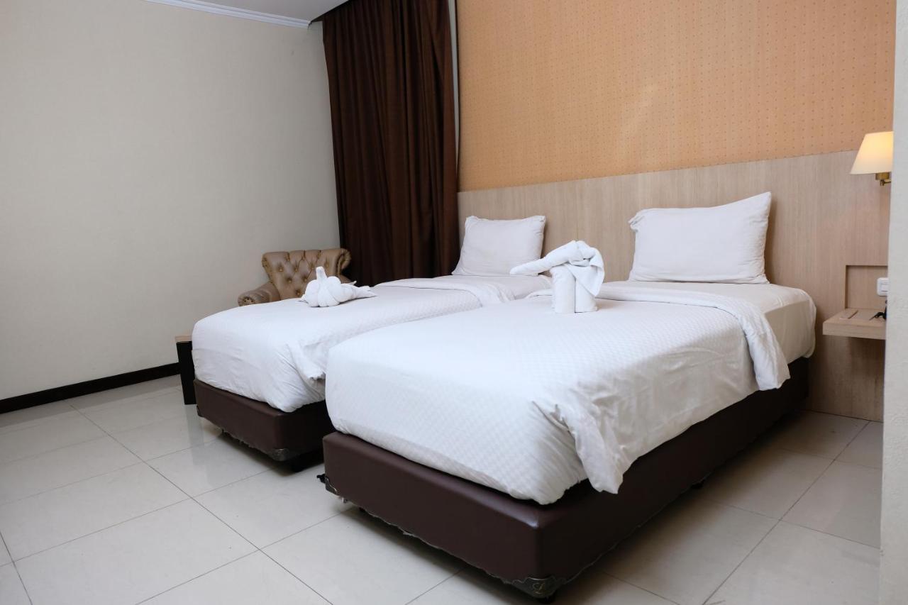 Rio City Hotel Palembang Esterno foto