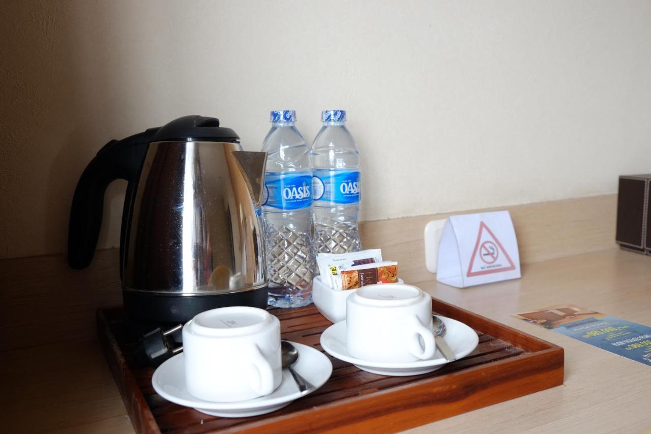 Rio City Hotel Palembang Esterno foto