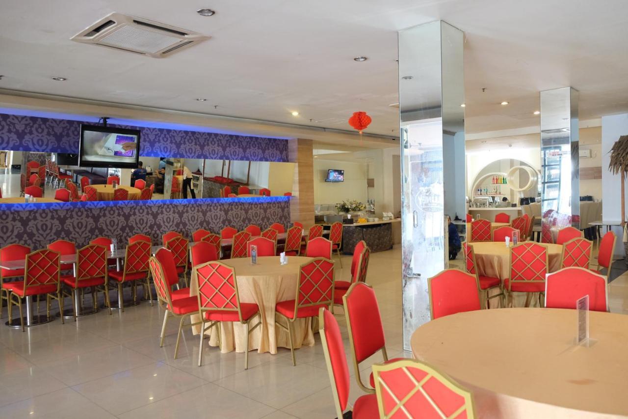 Rio City Hotel Palembang Esterno foto