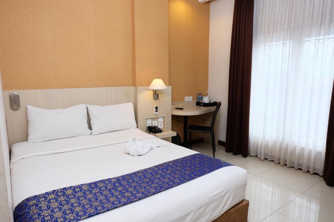 Rio City Hotel Palembang Esterno foto