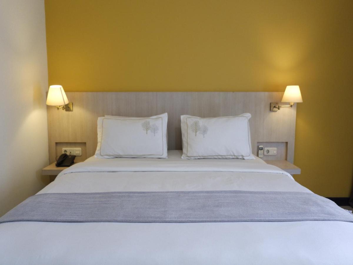 Rio City Hotel Palembang Esterno foto