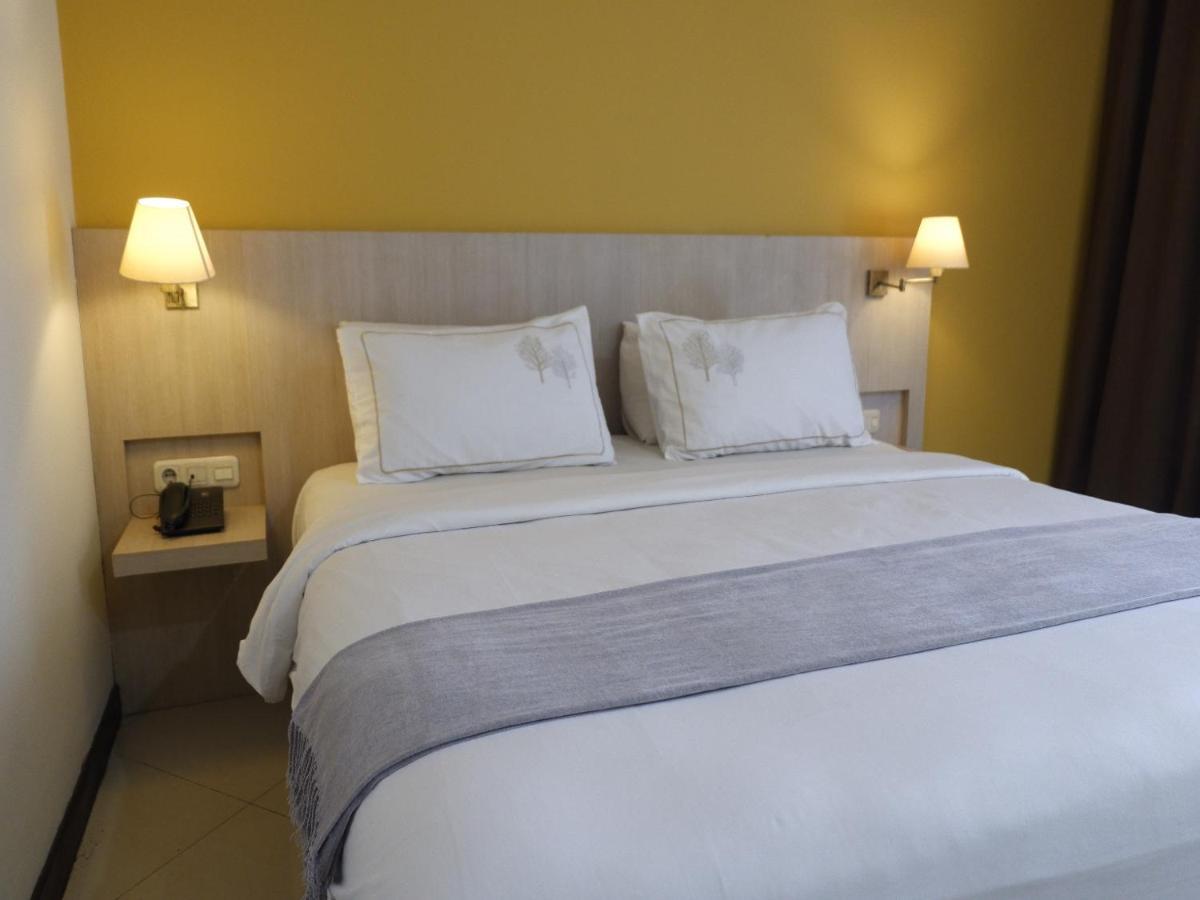 Rio City Hotel Palembang Esterno foto