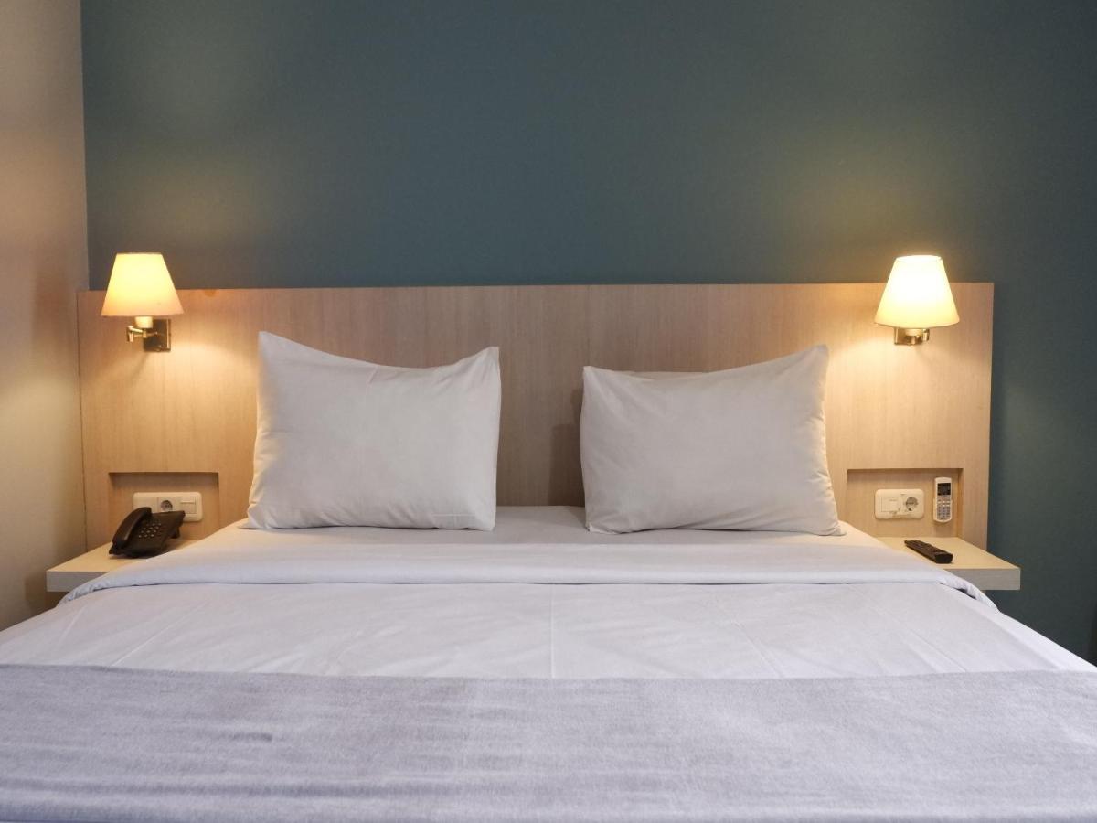 Rio City Hotel Palembang Esterno foto