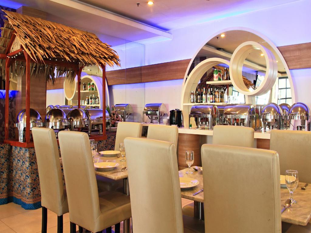 Rio City Hotel Palembang Esterno foto