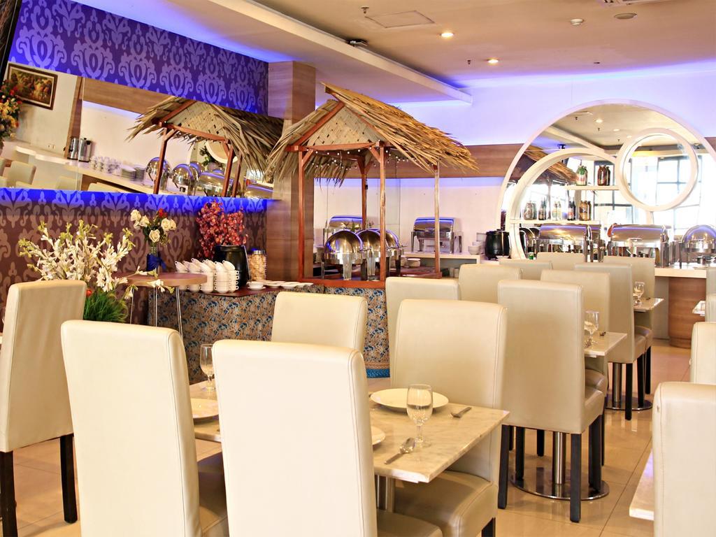 Rio City Hotel Palembang Esterno foto
